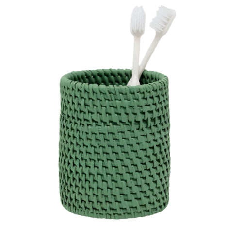 From the Dalton Bath Collection by Pigeon & Poodle, a green handmade rattan cup stylishly holds two white toothbrushes.