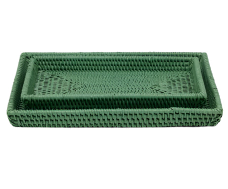 The Dalton Bath Collection by Pigeon & Poodle features a rectangular green woven rattan basket, handmade with organic dyes and raised edges, showcasing fine craftsmanship. Displayed on a white background.