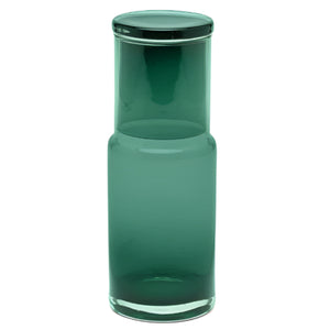 The Faro Smokey Green Carafe by Pigeon & Poodle features hand-blown glass and a matching cup that doubles as a lid—an elegant, functional piece to enhance any hospitality space.