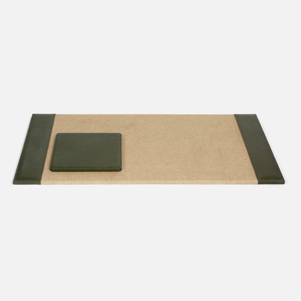 The Asby Desk Accessory Collection by Pigeon & Poodle features a rectangular beige mat with green edges and a matching green square cushion on the left—an elegant touch for any workspace.