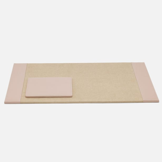 From the Asby Desk Accessory Collection by Pigeon & Poodle, this rectangular full-grain leather mat features neutral tones with pinkish-beige padded ends—one end has a small raised cushion—an elegant addition to your workspace.