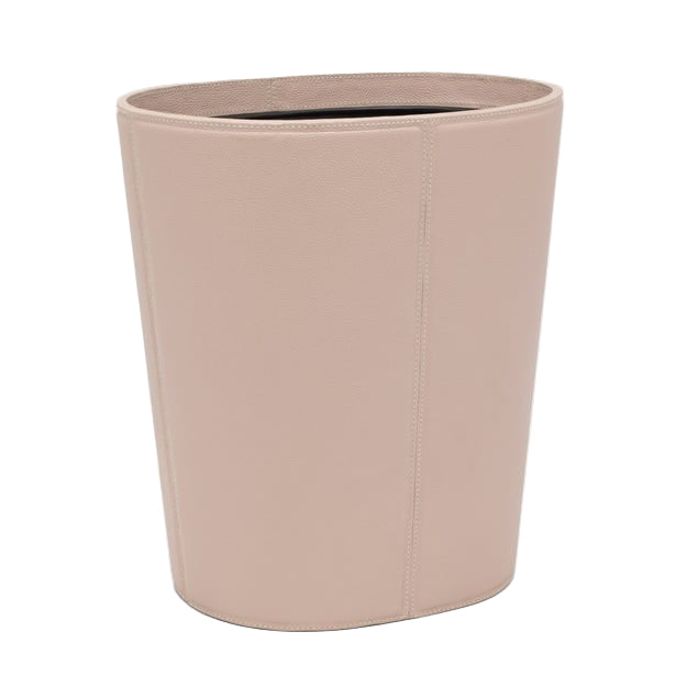 The Asby Desk Accessory Collection by Pigeon & Poodle features a beige, oval-shaped waste bin in full-grain leather with visible stitching—an elegant upgrade for your workspace.