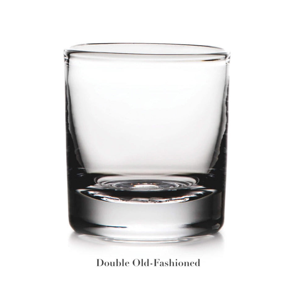 A clear, empty double old-fashioned glass from the Simon Pearce Ascutney Drinkware Collection is displayed against a white background with "Double Old-Fashioned" below it—an elegant example of handmade barware.