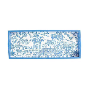 The Caspari Blue Pagoda Lacquer Bar Tray features a chinoiserie pattern with a pagoda, plants, and a fence. Handmade in Vietnam, this rectangular blue and white tray is perfect for elevating your table setting.