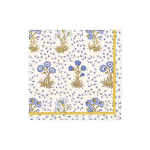 The Caspari Semis de Fleurs Blue Collection napkin features blue and yellow flowers with green stems, a yellow and blue floral border, and is crafted from eco-friendly, FSC-certified materials.
