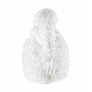 The Graciozza Egoist Spa Accessories hair towel is a white, textured wrap made from luxurious Egyptian Cotton Giza with a button closure at the back.