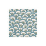 The Pontchartrain Scallop Collection by Caspari features eco-friendly, triple-ply napkins with a dense scalloped pattern of overlapping fan-shaped leaves in blue, green, and white.