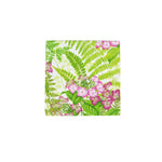 The Caspari Fern Garden Collection napkin features green fern leaves and pink flower clusters on white—a stylish choice for table settings and party supplies.