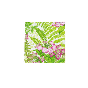The Caspari Fern Garden Collection napkin features green fern leaves and pink flower clusters on white—a stylish choice for table settings and party supplies.