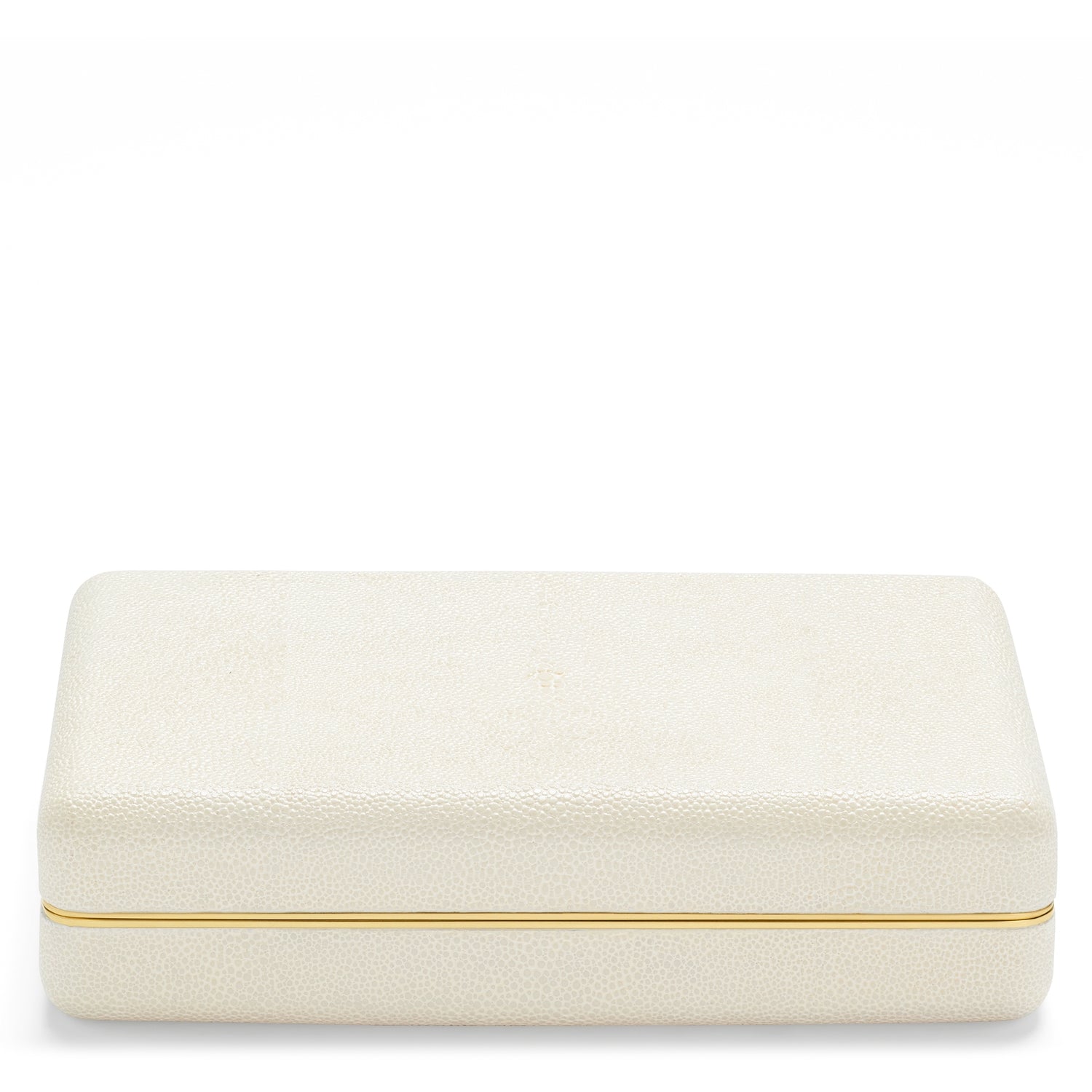 The Aerin Shagreen Card Set in cream features a closed rectangular box with embossed shagreen texture, gold trim, and a luxe suede interior.