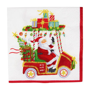 Celebrate the season with Caspari's Santa's Golf Cart Cocktail Napkin, featuring Santa in a festive golf cart and bordered in red. Made from triple-ply material and printed with non-toxic inks for stylish, safe holiday entertaining.