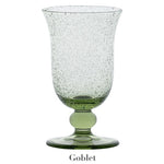 A green goblet from Juliska’s Provence Basil Drinkware Collection, featuring a textured design with a round base and flared rim, is displayed against a white background. “Goblet” appears below this Provence-inspired glassware.