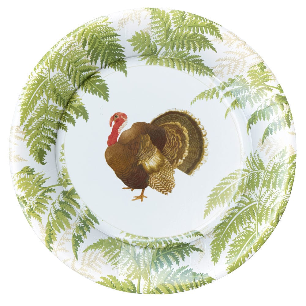 The Caspari Turkey Among Ferns Partyware Collection features a decorative plate with green fern borders and a central turkey illustration, ideal for festive Thanksgiving tableware or themed gatherings.