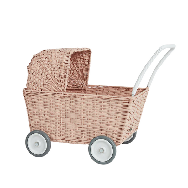 A pink convertible pram with wheels on a white background by Ollie and Ella
