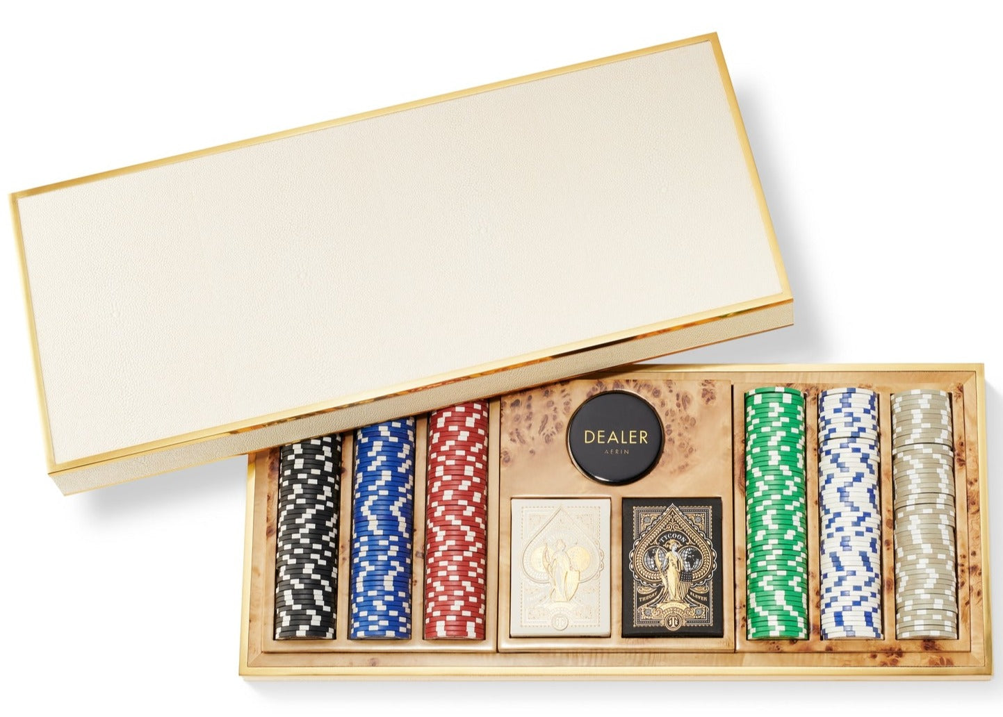 The Aerin Shagreen Poker Set in Cream features a luxurious cream and gold case, vibrant poker chips, two decks of cards, and a sleek black dealer button.