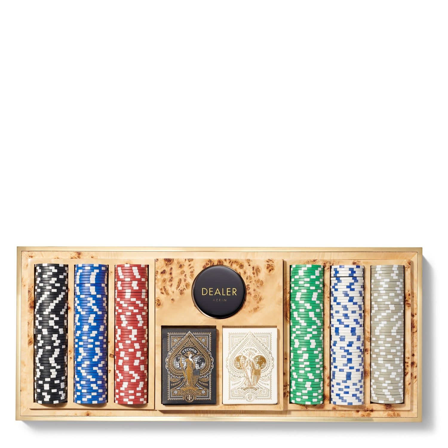 The Aerin Shagreen Poker Set in Cream features stacks of colorful poker chips, two decks of cards, and a round "DEALER" button, all elegantly housed in a luxurious shagreen case.