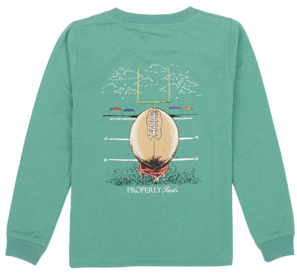 A green long-sleeve cotton tee with an image of a football by Properly Tied Signature LS Tee.