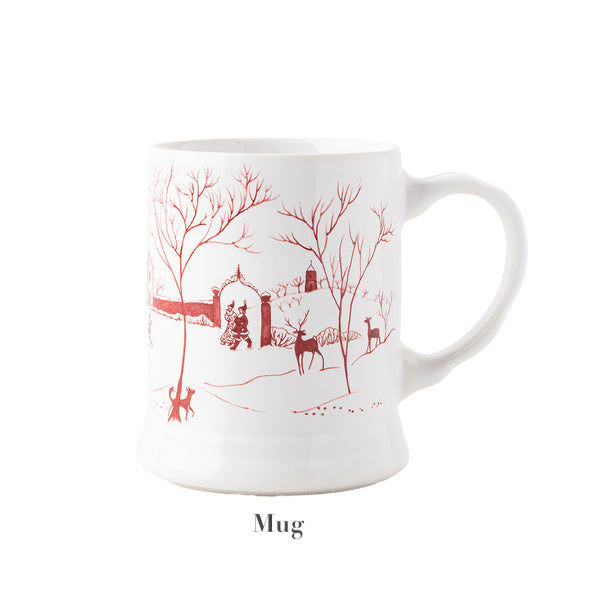Juliska’s Country Estate Winter Frolic Ruby mug is a white ceramic piece with a curved handle, featuring festive winter scenes of trees, deer, and people inspired by an English country estate.