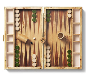 The Aerin Croc Leather Backgammon Set features an open board with checkers, dice, a 32 doubling cube, and two dice cups on a wooden surface, all in a luxurious Italian leather crocodile finish.