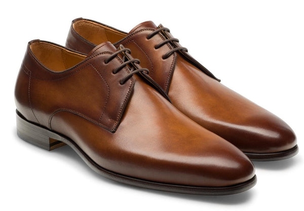 A pair of Magnanni Maddin Lace-Up polished brown calfskin leather plain toe derby dress shoes.