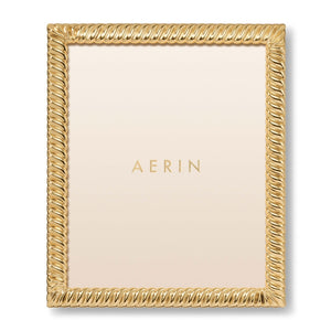 The Loretta Frame Collection by Aerin features a gold frame with a classic twist design, ideal for elegant photo displays, and showcases the "AERIN" logo on a light background.