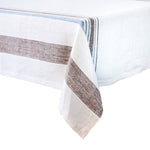 The Juliska Danish Stripe Table Linen Collection features wide brown and blue stripes, blending minimalist elegance with classic Scandinavian design.