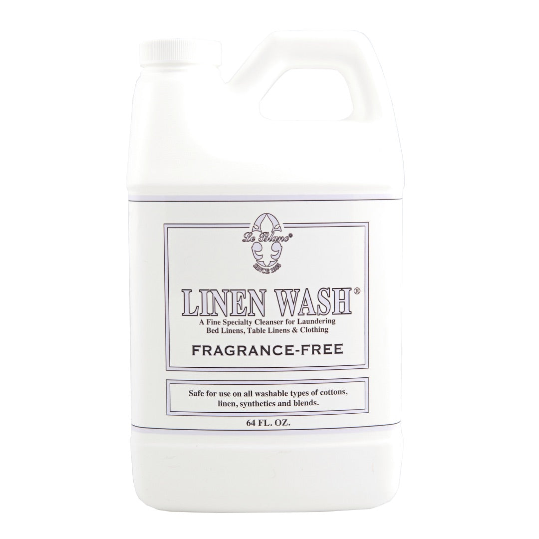 Le Blanc Linen Wash, fragrance-free, in a 64 fl. oz. container—ideal for cold water washing and safe for all washable cottons, linens, synthetics, blends, and luxury bed linens.