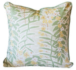 The Ashbee Botanical Pillow by Associated Design features a custom-made square design with a green and white leafy fern pattern, accented by small yellow and white flowers, crafted from premium materials.