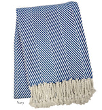 The Nantucket Herringbone Throw Collection by A Soft Idea features a folded navy and white throw with hand-knotted fringe, classic herringbone pattern, and soft cotton craftsmanship.