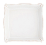 The Berry & Thread Classic Whitewash Matzoh Plate by Juliska is a handcrafted white ceramic plate featuring slightly raised, curved edges and decorative corner details, designed to honor family traditions.