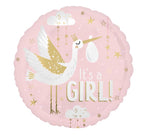 The Signature Balloon by Burton+Burton is a pink, round balloon featuring a stork carrying a baby bundle with the text "It's a GIRL!" surrounded by clouds and stars, making it perfect for pairing with floral arrangements or adding to your local delivery order.