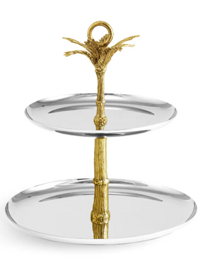 The Michael Aram Palm 2-Tier Etagere features round silver trays and a sculpted gold handle with an antique bamboo-inspired finish, combining elegance and texture from the Palm Collection.
