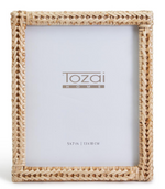 Rectangular woven rattan frame with a natural finish by Two's Company, fits a 5x7 inch (13x18 cm) photo—perfect for tabletop display.