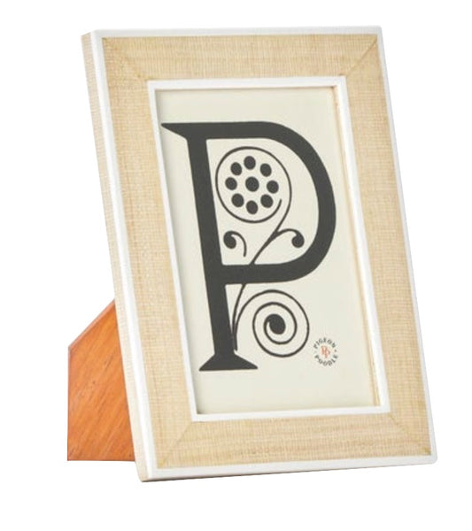 A framed monogram of the letter 'p' with decorative elements on a stand, crafted from Pigeon & Poodle Aberdeen Frame Collection and Narra veneer wood.