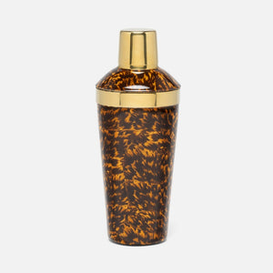 The Blue Pheasant Maximilian Bar Collection cocktail shaker features a gold-tone lid and band with a bold faux tortoise shell design, showcased against a plain white background.