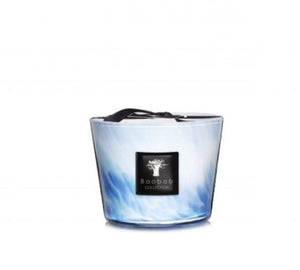 A decorative scented candle in a glass jar with a blue and white marbled design, featuring an amber aroma and carrying the label "Baobab Collection," is known as the Baobab Collection Eden Seaside Candle from the brand Baobab.