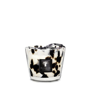 A Baobab Collection Pearls Black Candle in a glass holder with a black and white animal print design, isolated on a white background.