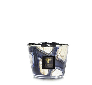 A scented Baobab Collection Stones Lazuli Candle in a decorative glass holder with a marbled blue and white design reminiscent of Lazuli Stones.