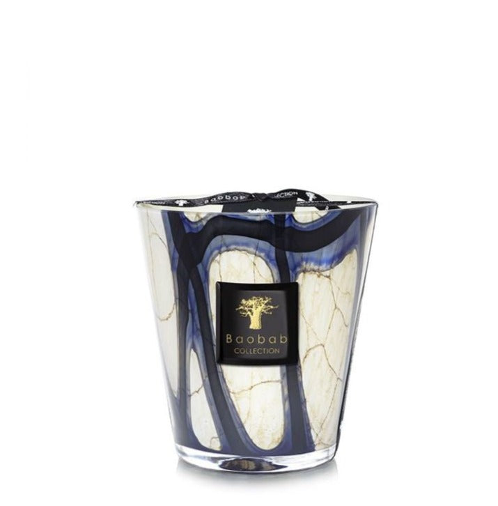 A Baobab Stones Lazuli candle in a glass holder with blue and white swirling patterns, isolated on a white background.