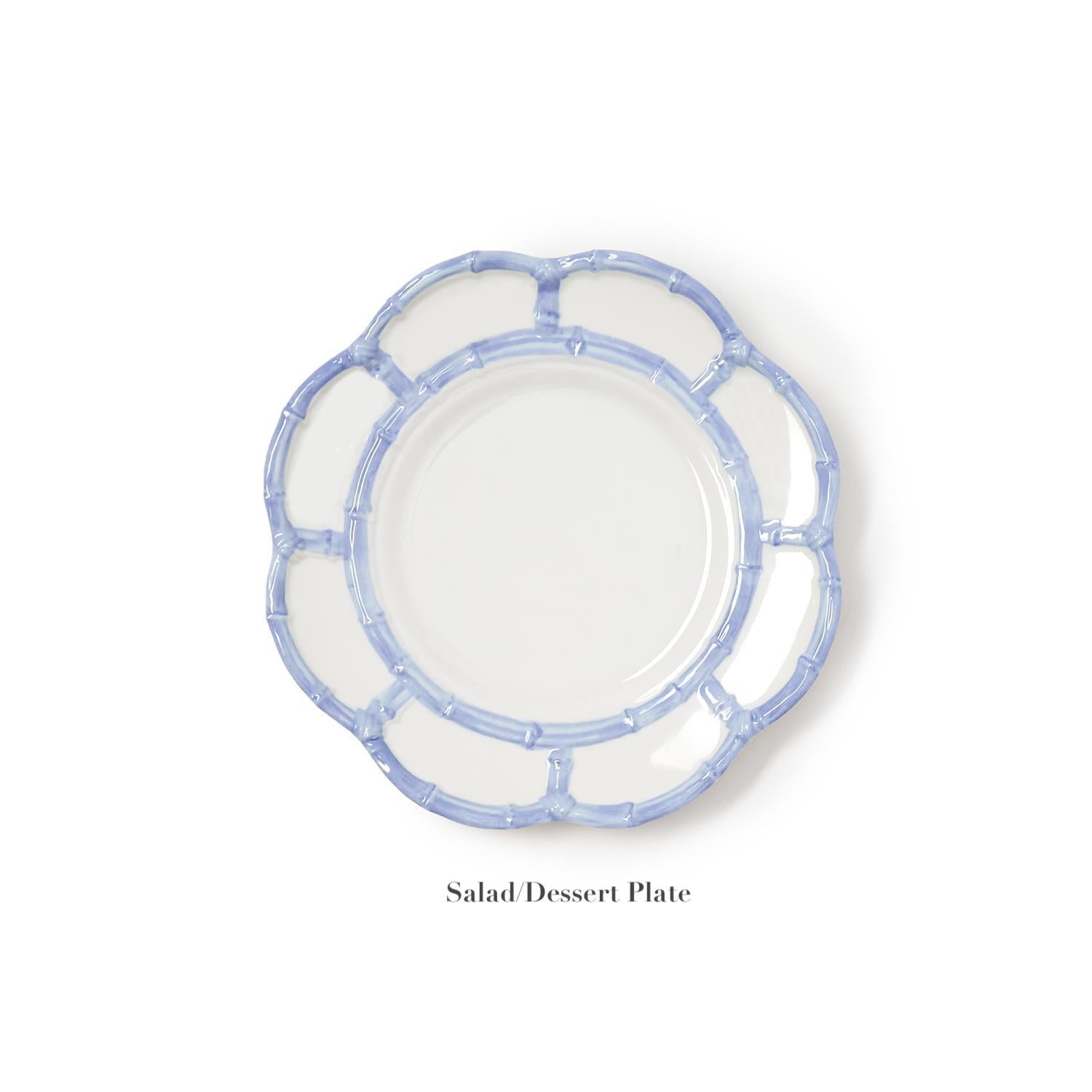 A round salad or dessert plate from the Melamine Bamboo Dinnerware Collection by Two's Company, crafted from shatter-resistant melamine with a translucent scalloped blue rim, displayed on a white background.