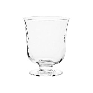 The Juliska Puro Clear Glass Vase from the Vase/Votive Collection features a contemporary silhouette with a short stem and round base, photographed on a white background.