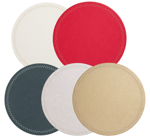 Five round felt coasters from the Kim Seybert Starry Night Placemat Collection, in red, white, gray, gold, and off-white with metallic trim, are arranged in an overlapping pattern on a white background.