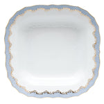 The Herend Fish Scale Square Fruit Dish, Light Blue, features scalloped edges and a white center with hand-painted blue and gold trim, offering artistic appreciation similar to classic Herend porcelain.
