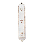 The Juliska Berry & Thread Whitewash Mezuzah is a white ceramic case with Berry & Thread detailing, a central brown "Shin," and wall-mounting holes at the top and bottom.