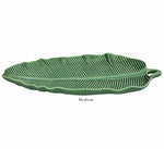 The HIVE Banana Leaves Platter Collection features a medium ceramic handmade platter with detailed banana leaf ridges, showcased on a plain white background.