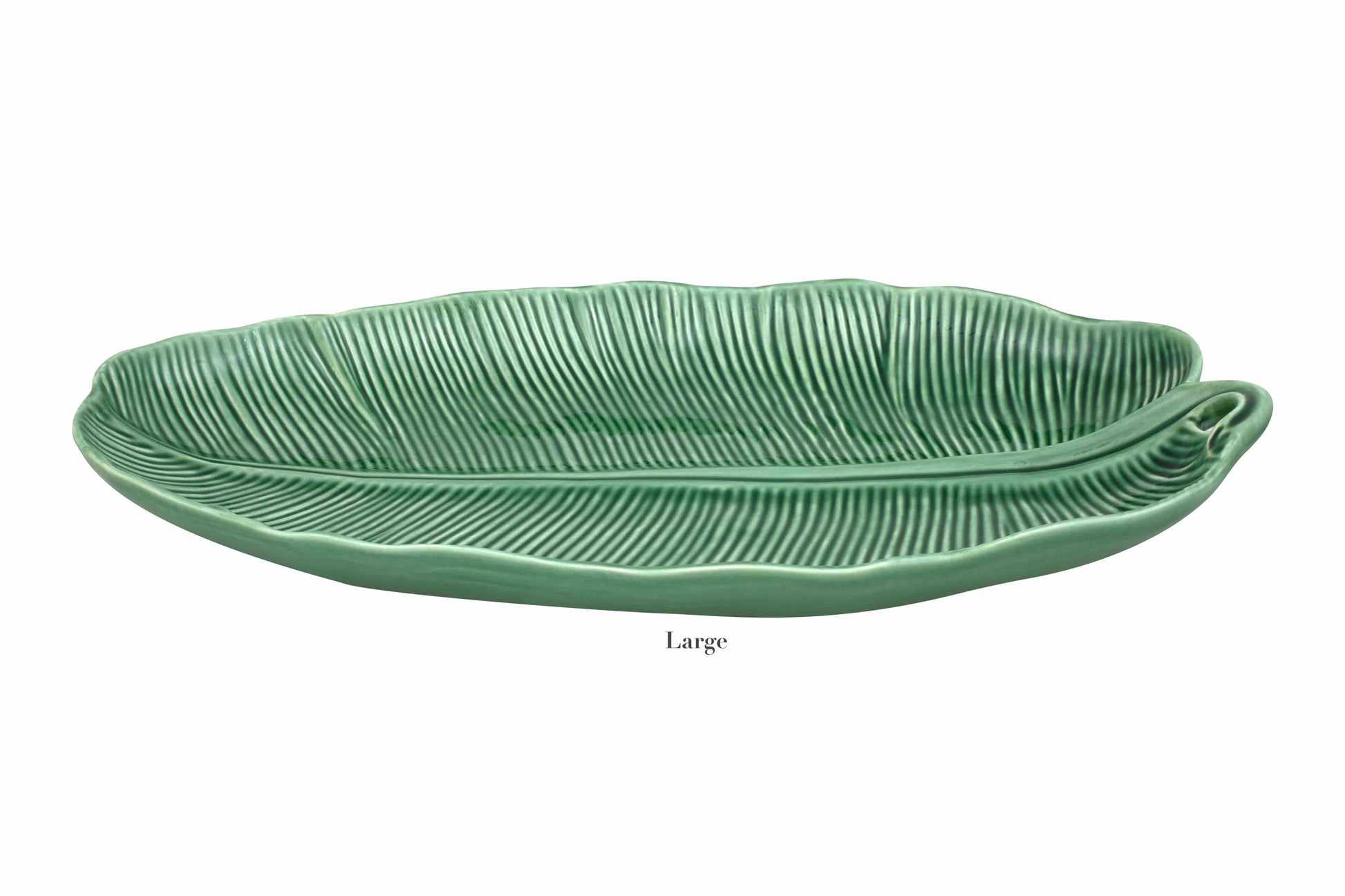 A large green ceramic platter from the HIVE Banana Leaves Platter Collection, shaped like a banana leaf with ribbed detailing, is displayed on a white background.