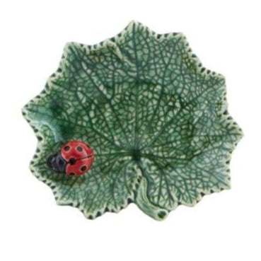 The Bordallo Pinheiro Countryside Leaves Dish Collection offers a whimsical ceramic, leaf-shaped dish with a red and black ladybug—perfect as an earthenware catchall or playful decorative accent.