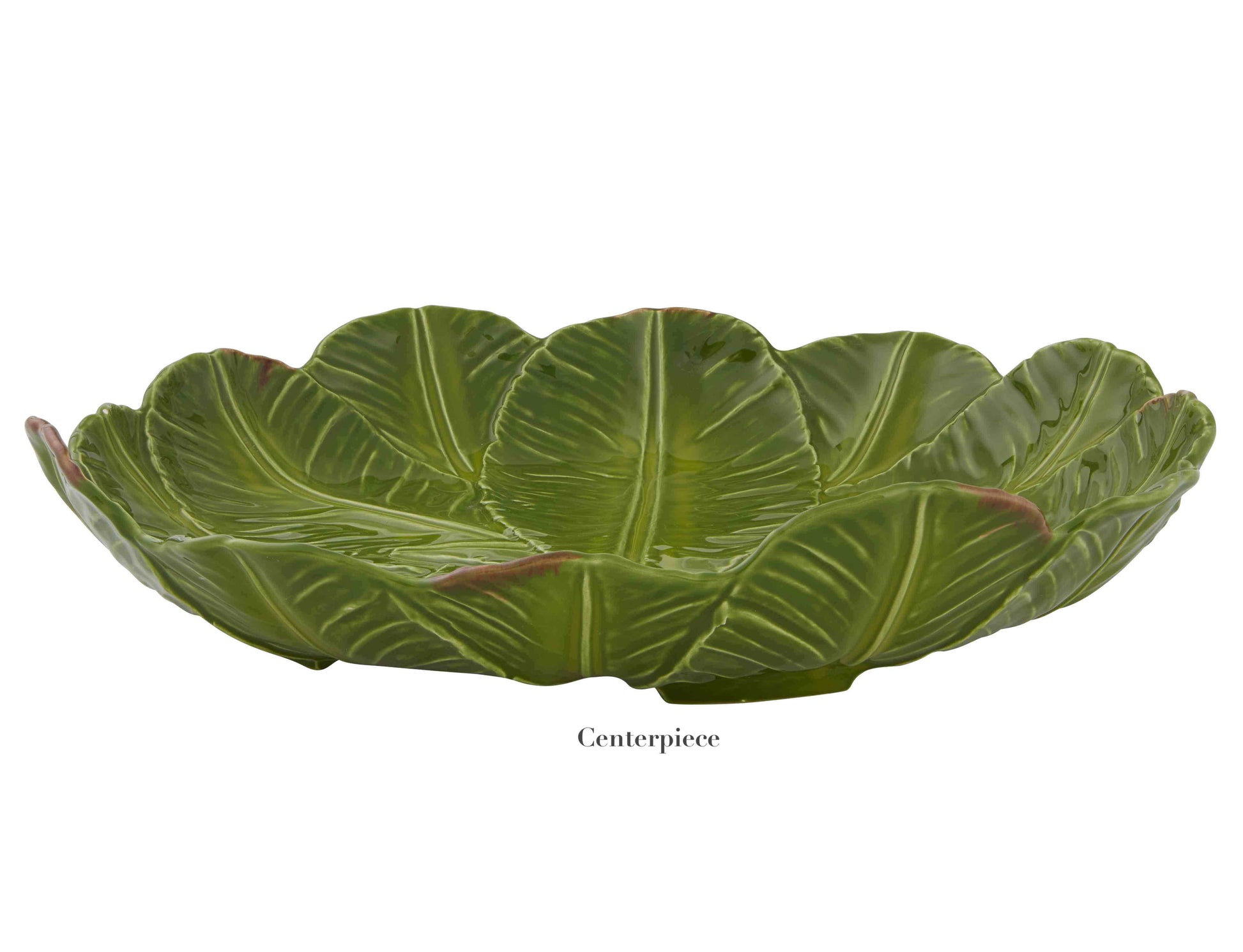 The Bananas From Madeira Serveware Collection by Bordallo Pinheiro features a green ceramic bowl shaped like overlapping lettuce leaves, labeled "Centerpiece" below, ideal for adding a tropical vibe to your table.