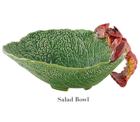 The Bordallo Pinheiro Cabbage with Lobsters Serveware Collection includes a distinctive green leaf-shaped salad bowl featuring a red lobster handle.