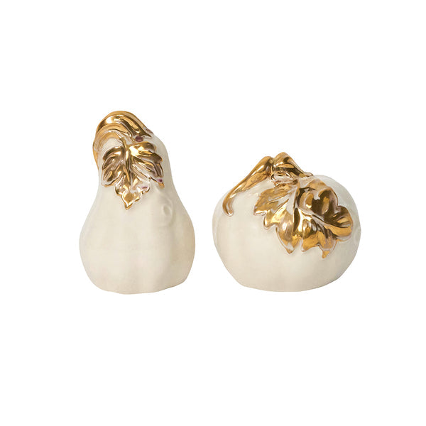 Two white ceramic gourds from the Juliska Forest Walk Tabletop Collection, adorned with gold-painted leaves and ideal as elegant place card holders, are displayed side by side against a plain white background.